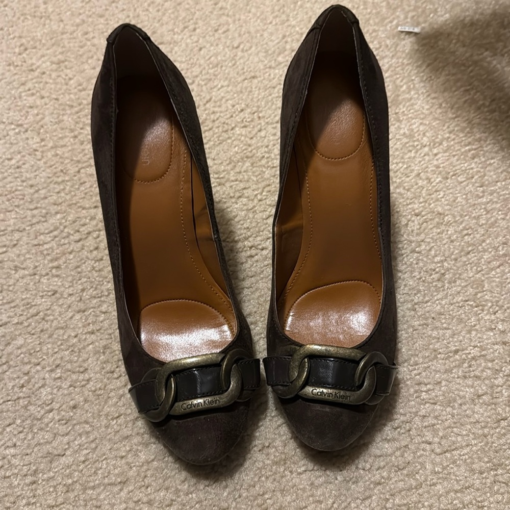Brown suede Calvin Klein heels.